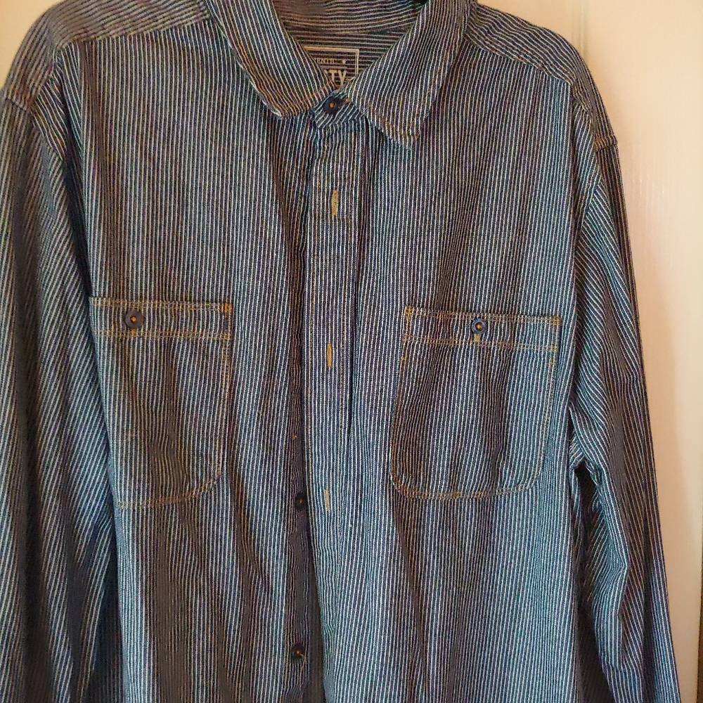 Blue and white striped denim shirt.